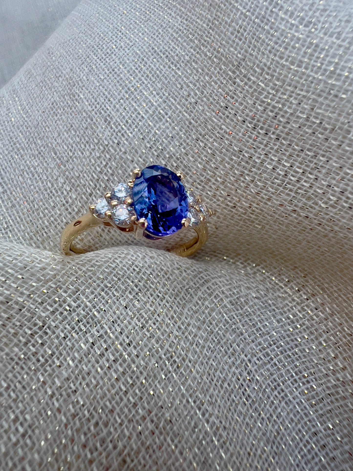 Tanzanite oval diamond ring.