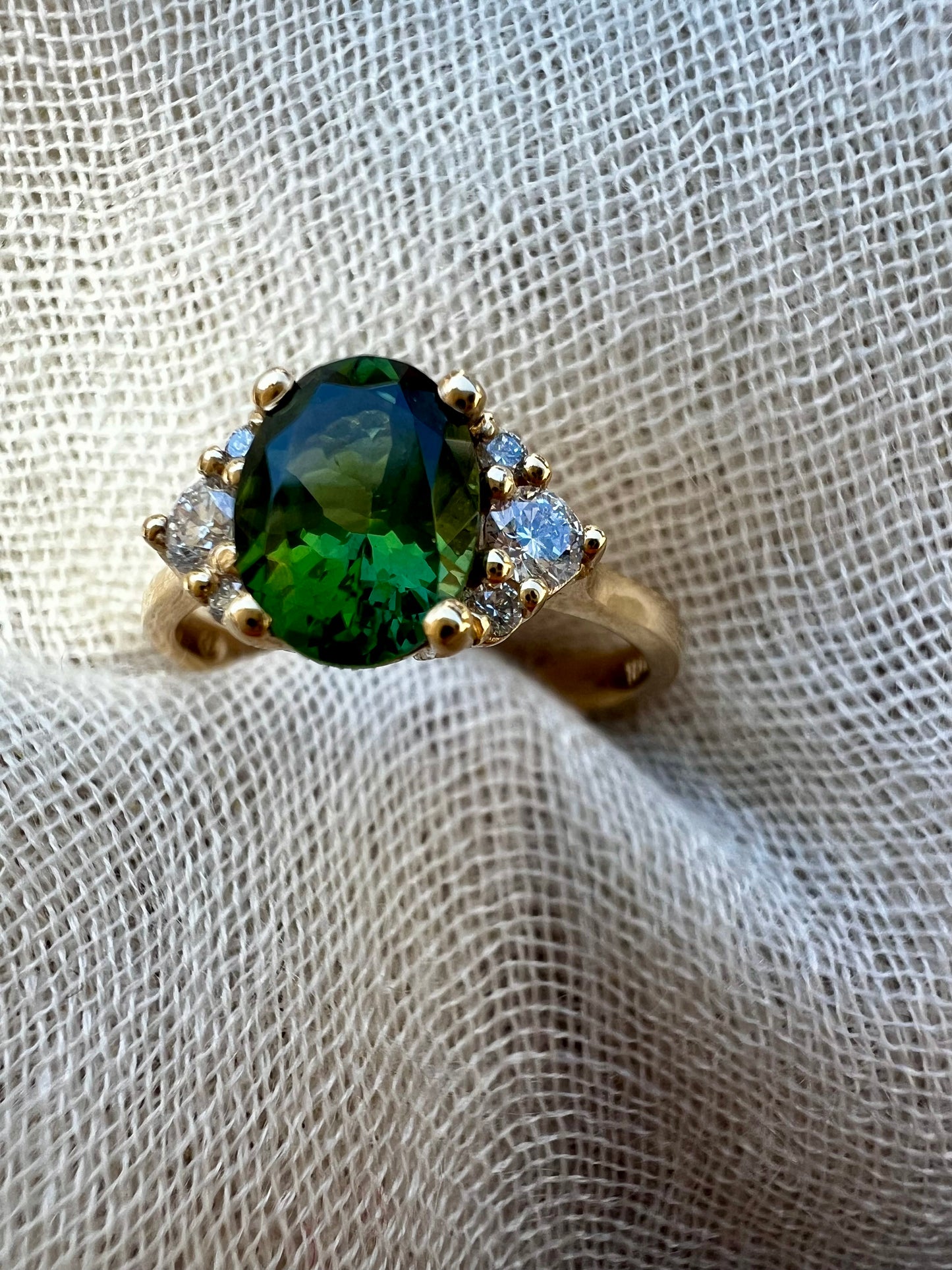 Green Tourmaline ring in yellow gold