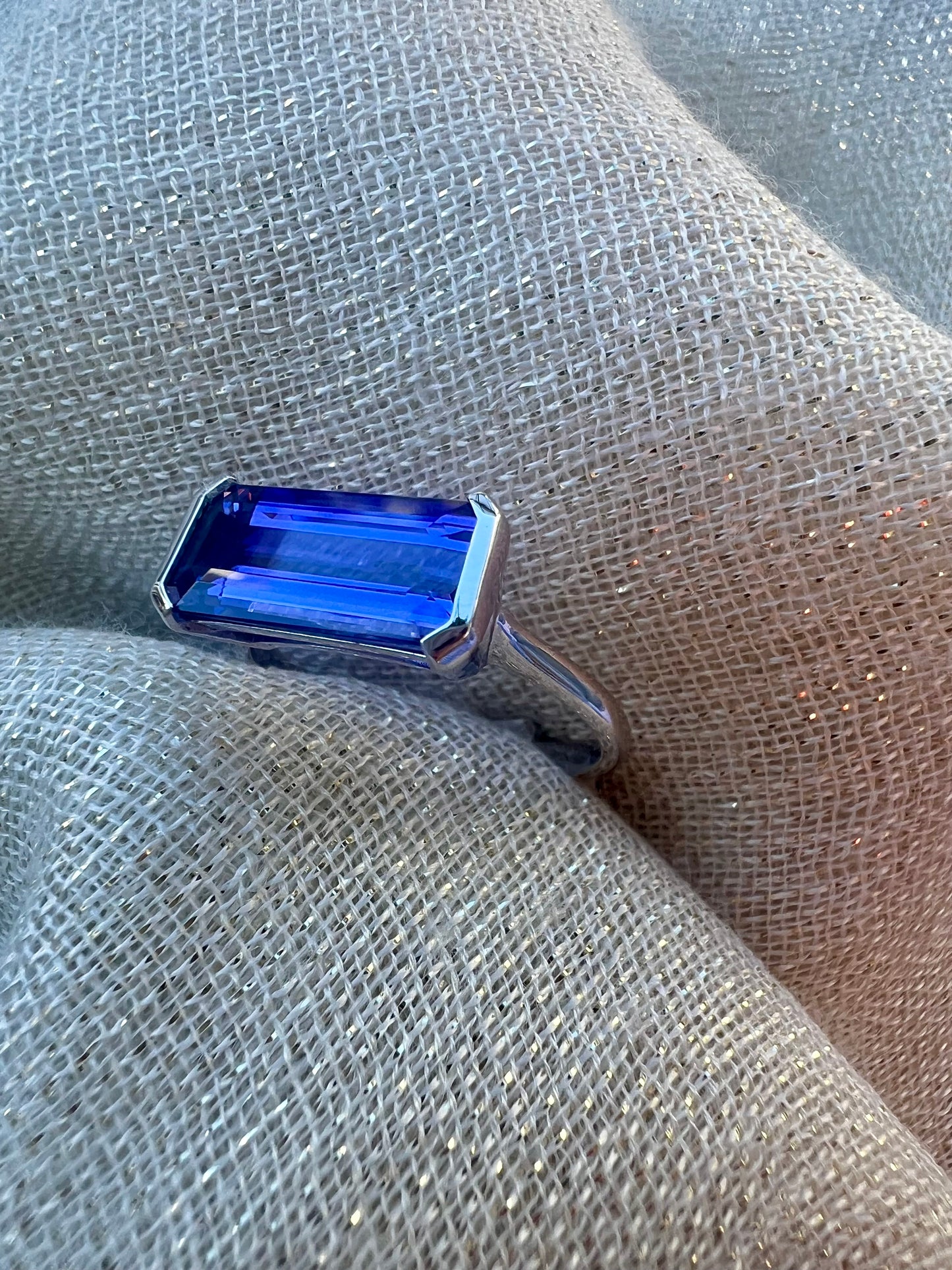 Tanzanite Emerald cut side set ring