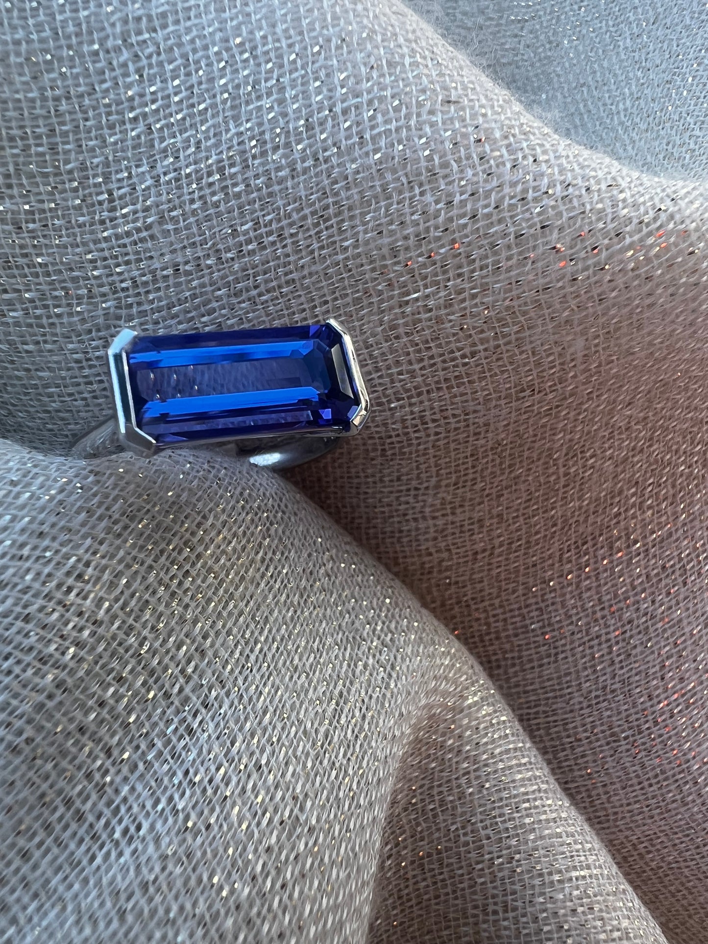Tanzanite Emerald cut side set ring