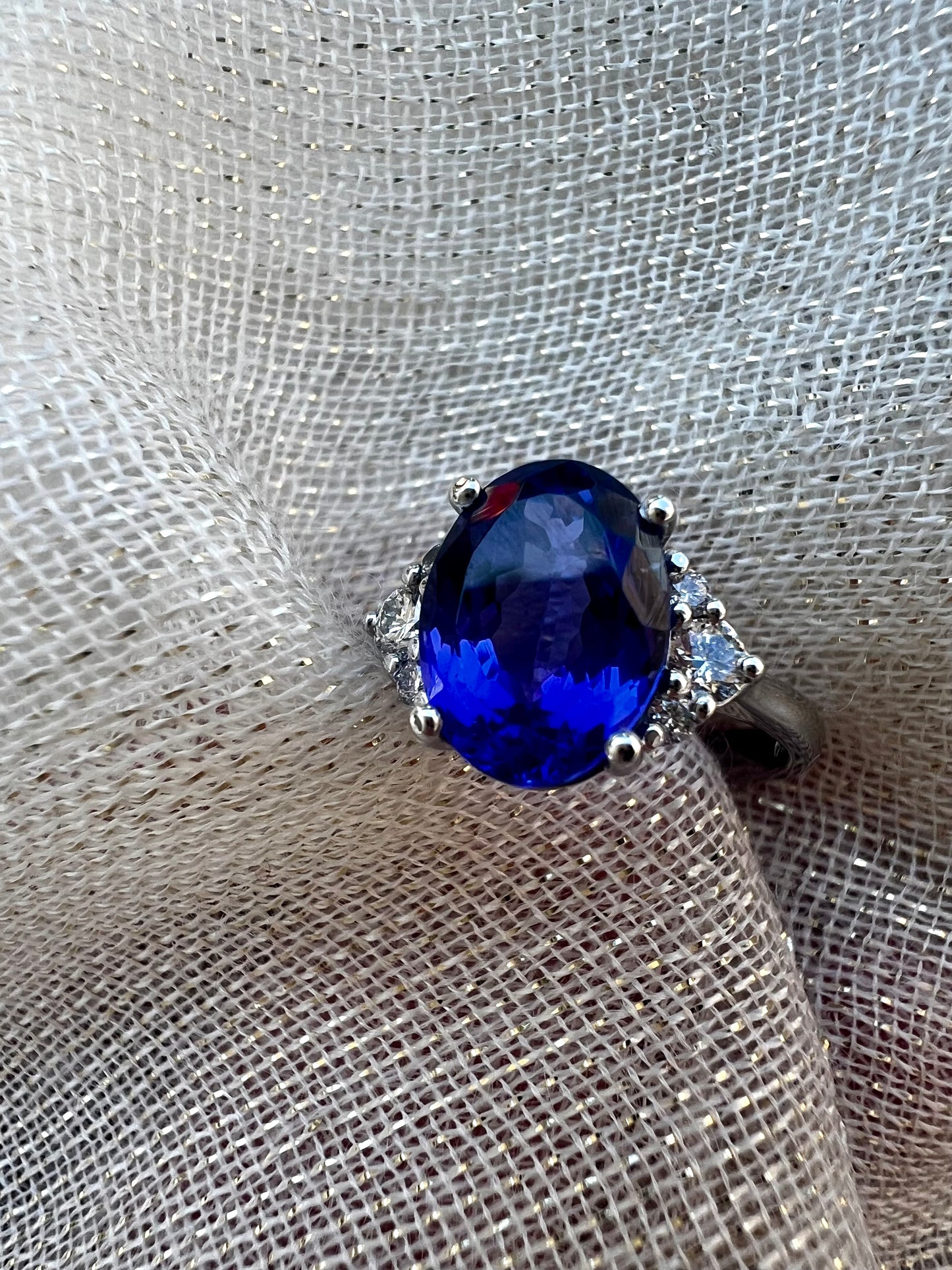 Tanzanite oval ring with diamonds