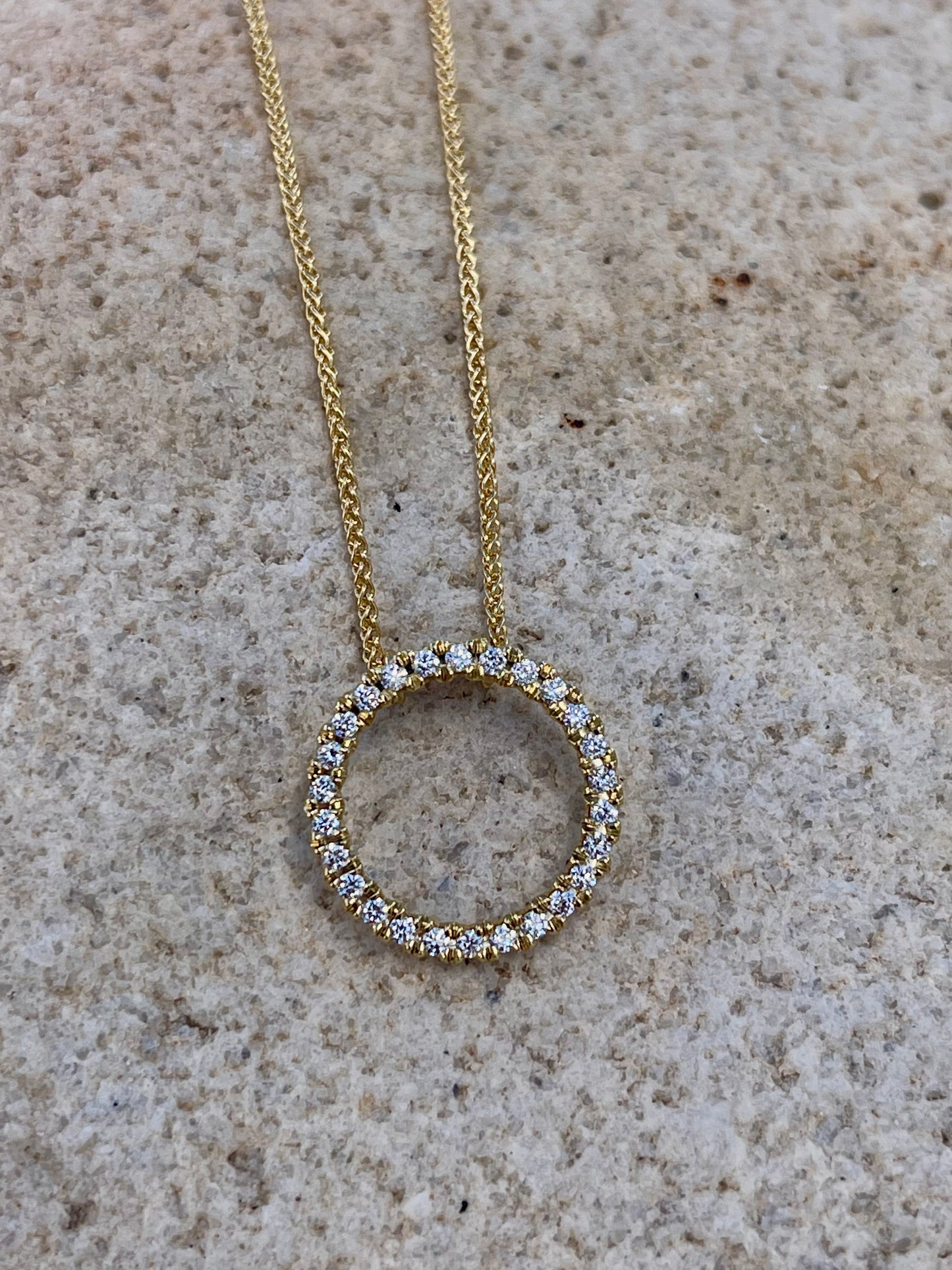 Yellow gold diamond circle pendant