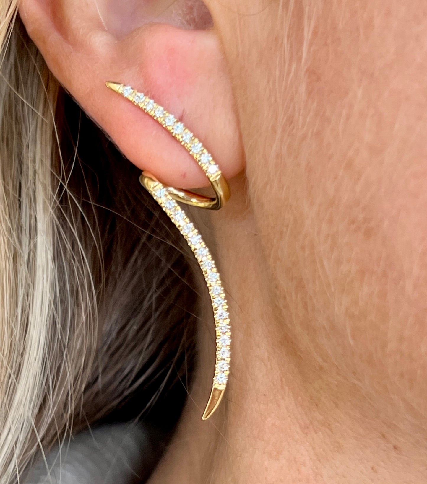 Yellow gold diamond swirl earrings