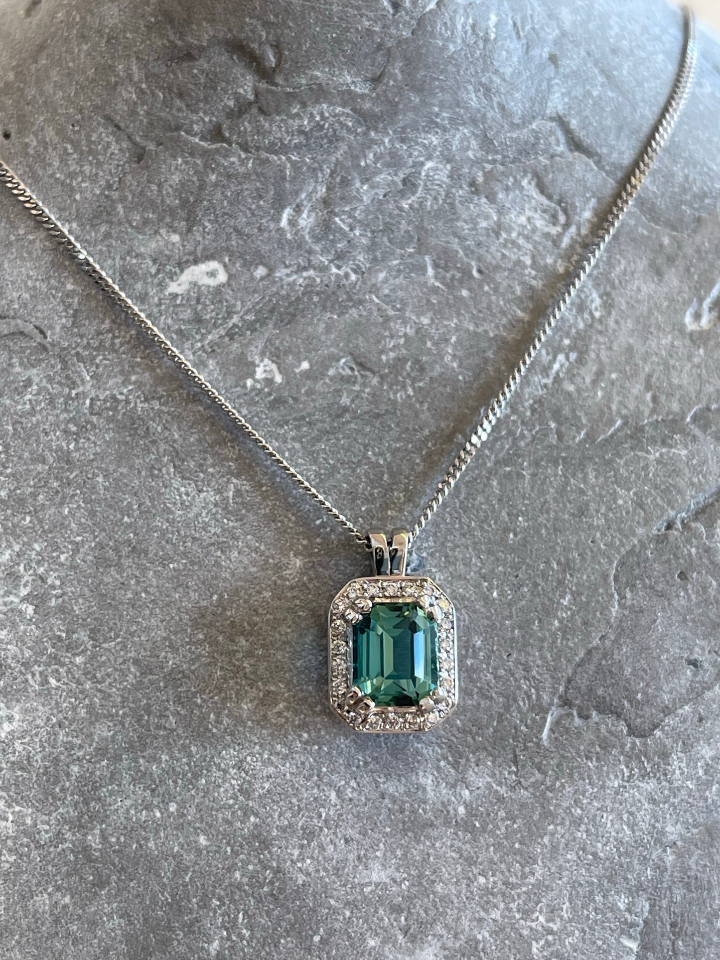 Lagoon green Tourmaline pendant with halo