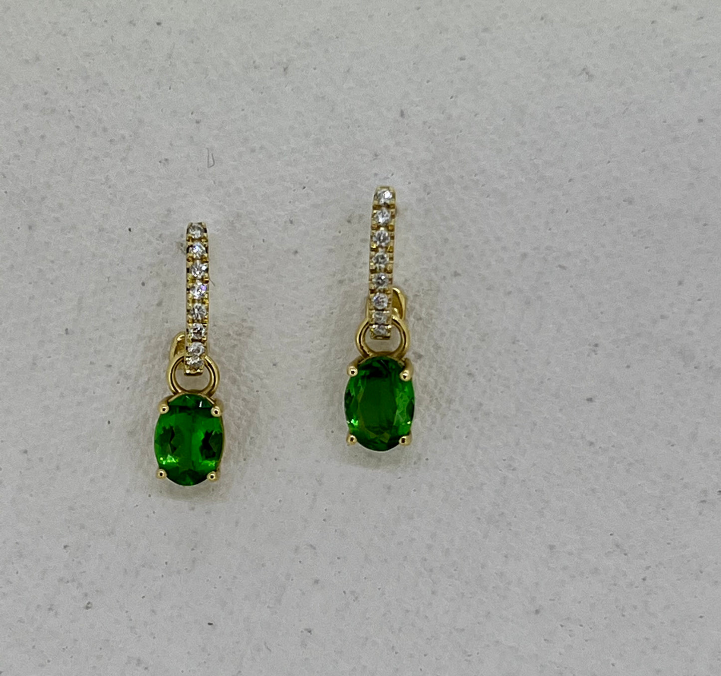 Tsavorite ovals on yellow diamonds Huggies