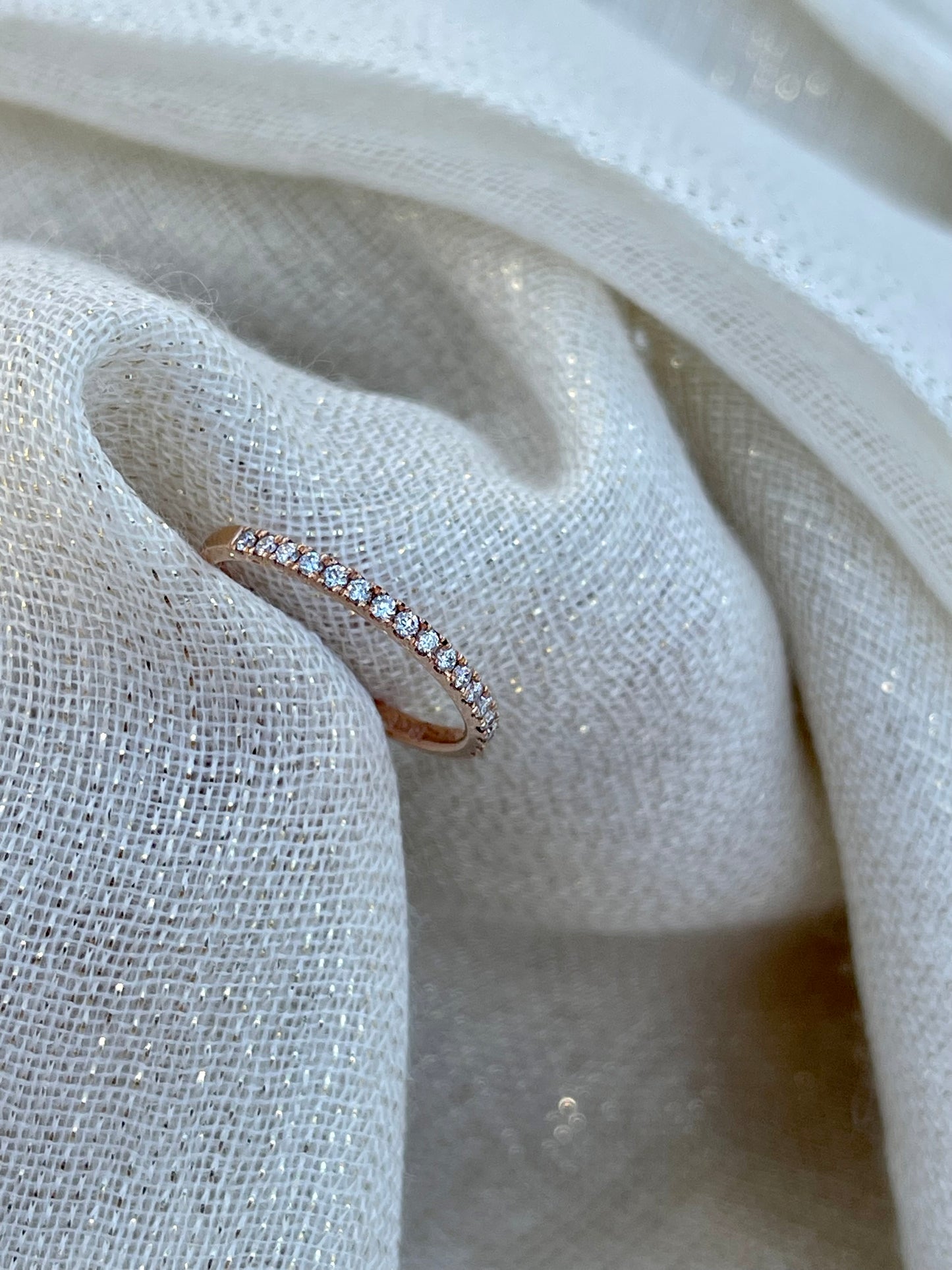 Rose gold half eternity band