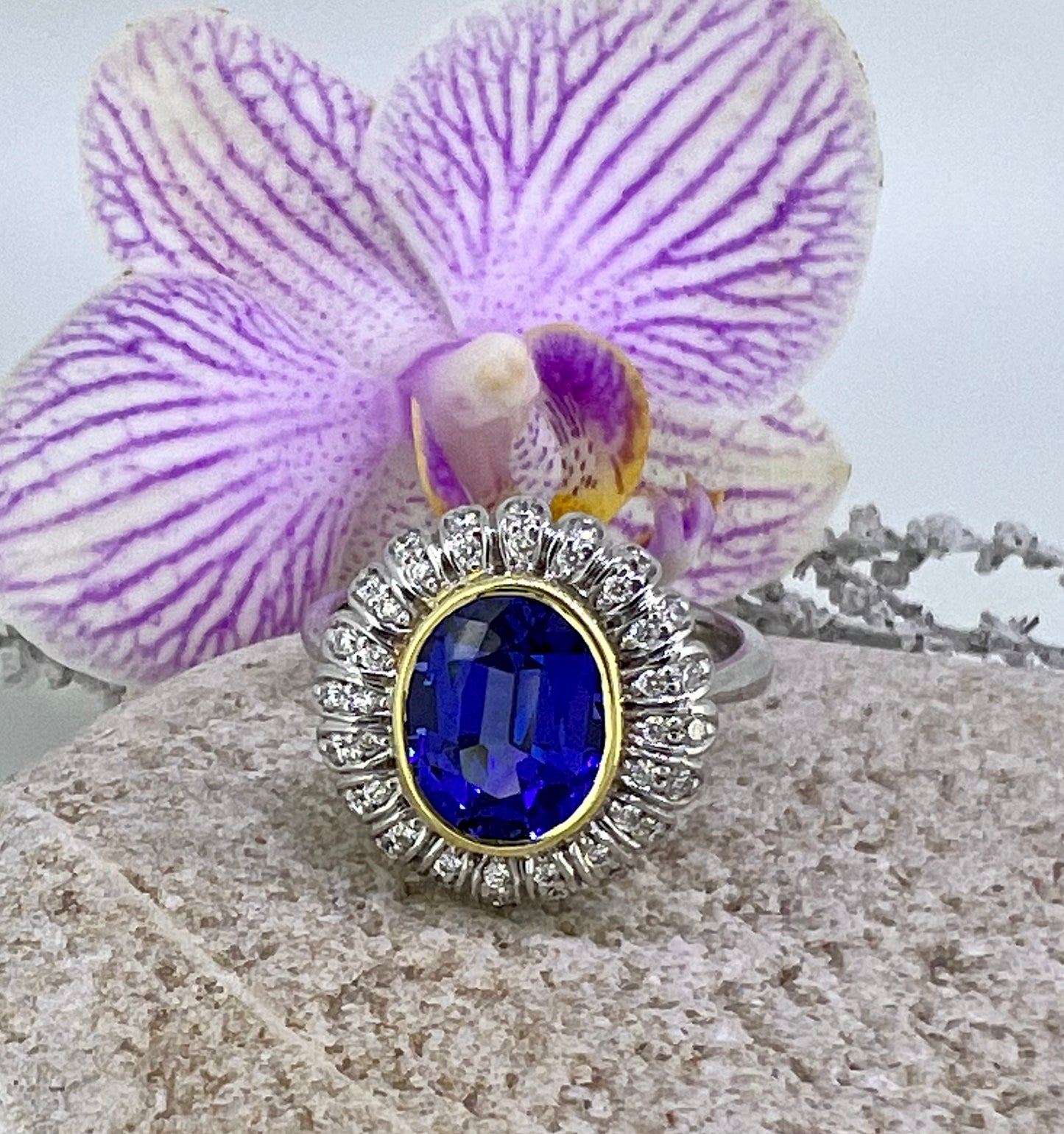 Tanzanite oval ring in white and yellow gold