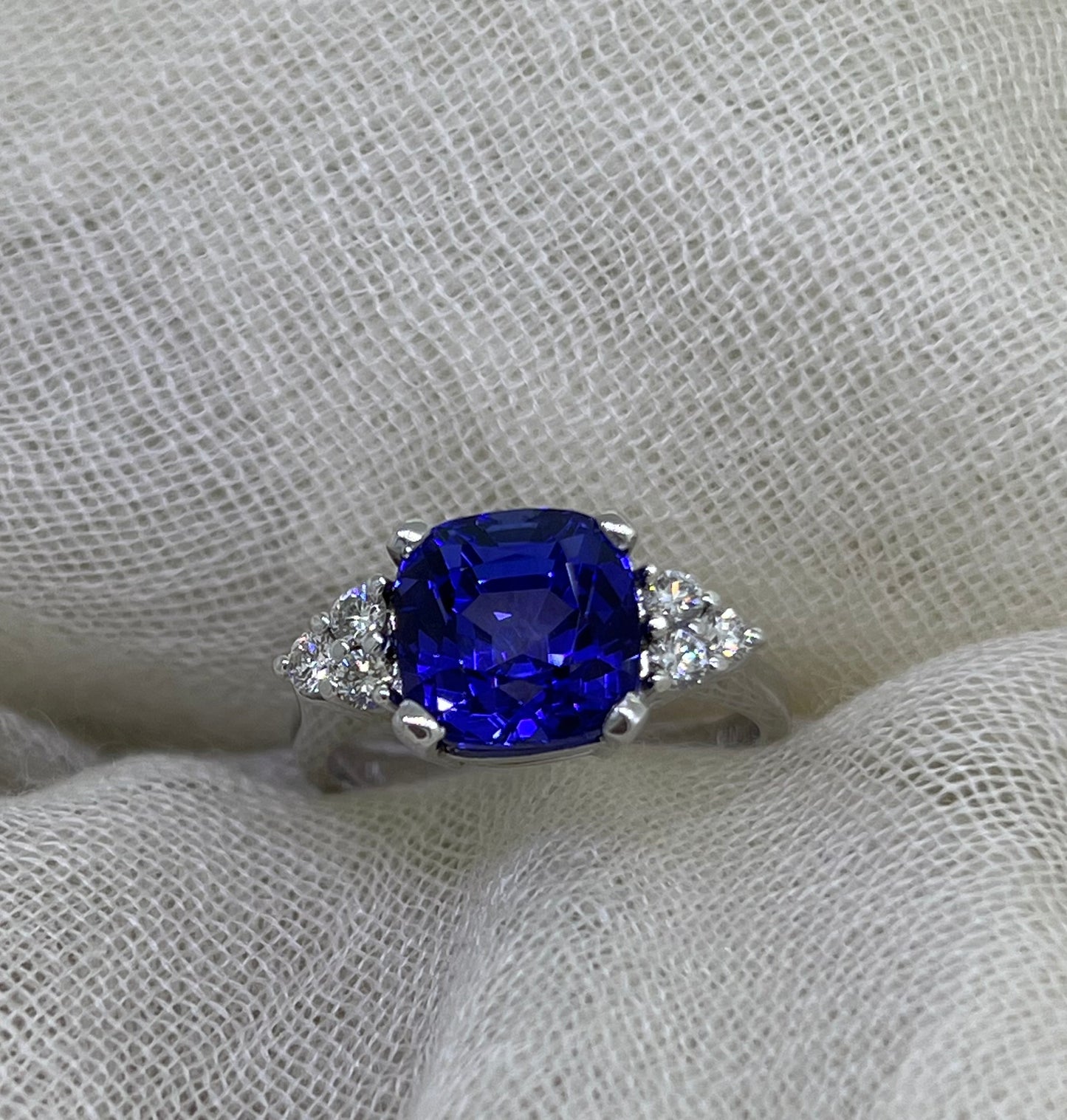 Tanzanite with side trio of diamonds