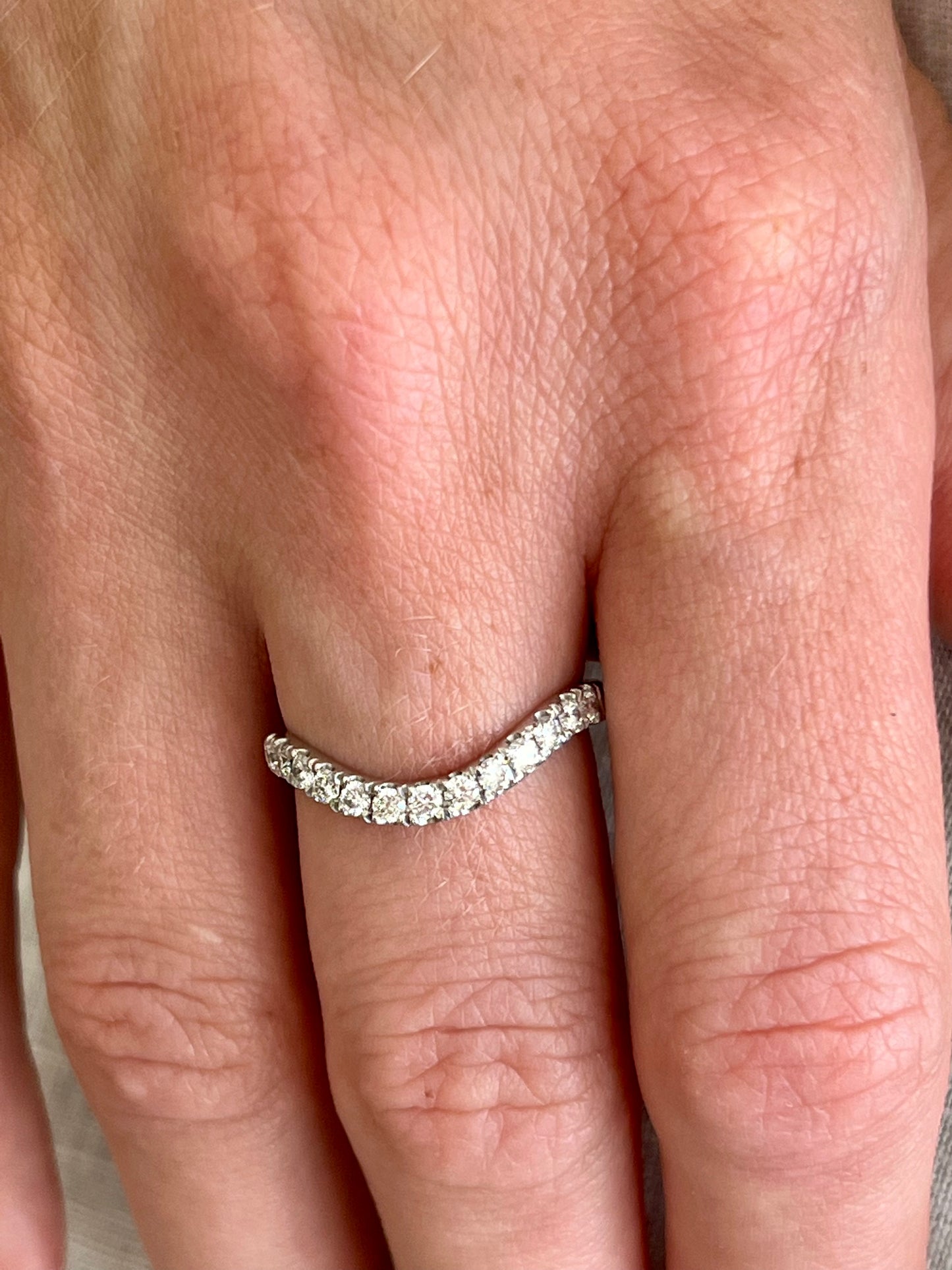 Curved eternity band.