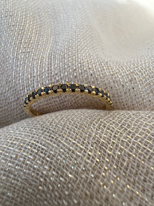 Black diamond half eternity ring in yellow gold