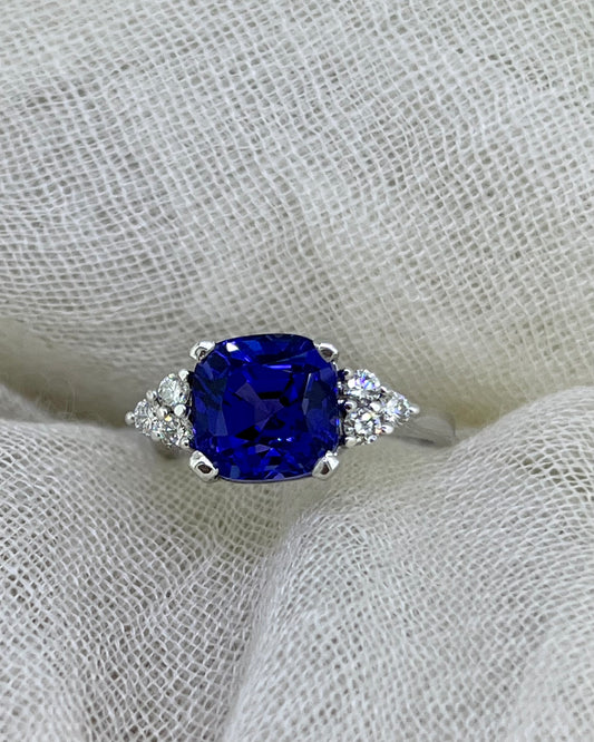 Tanzanite with side trio of diamonds