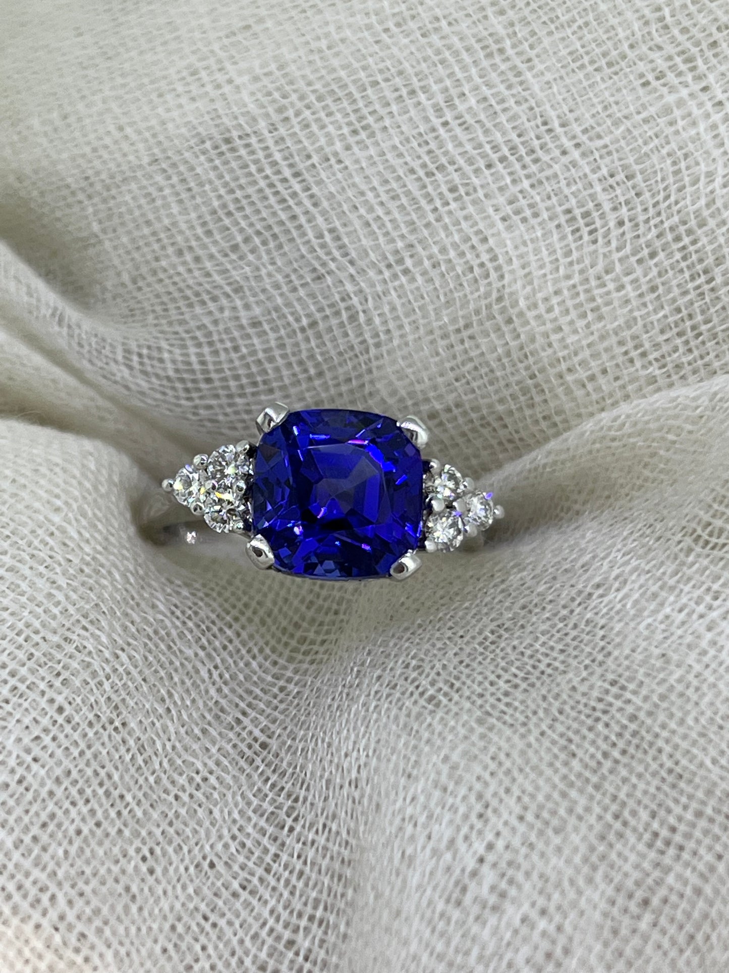 Tanzanite with side trio of diamonds