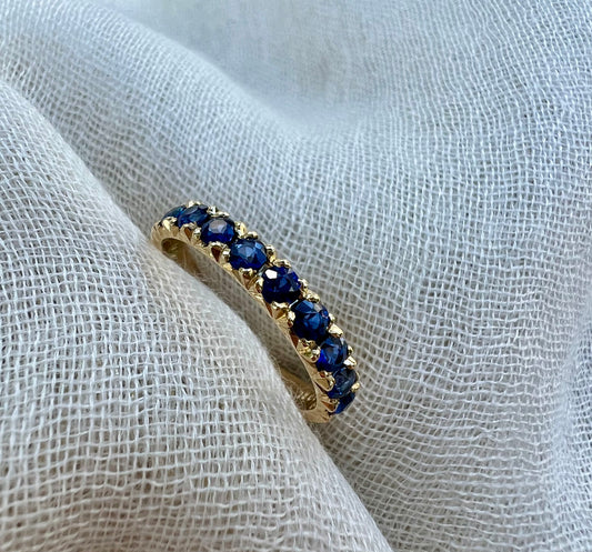 Sapphire half eternity band