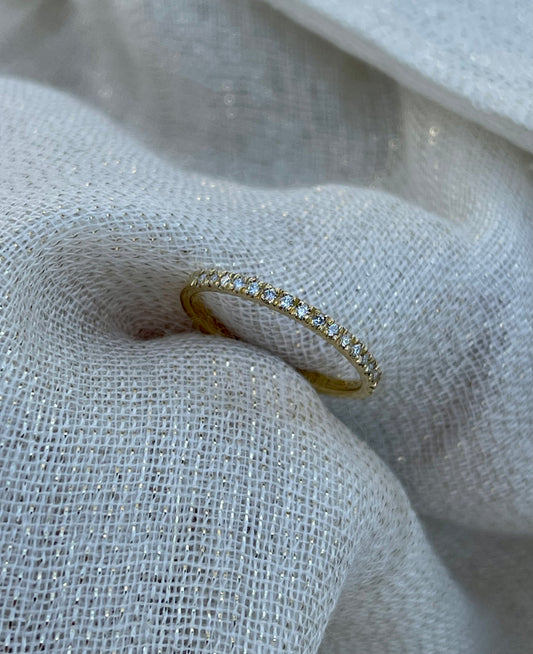 Yellow gold half eternity band