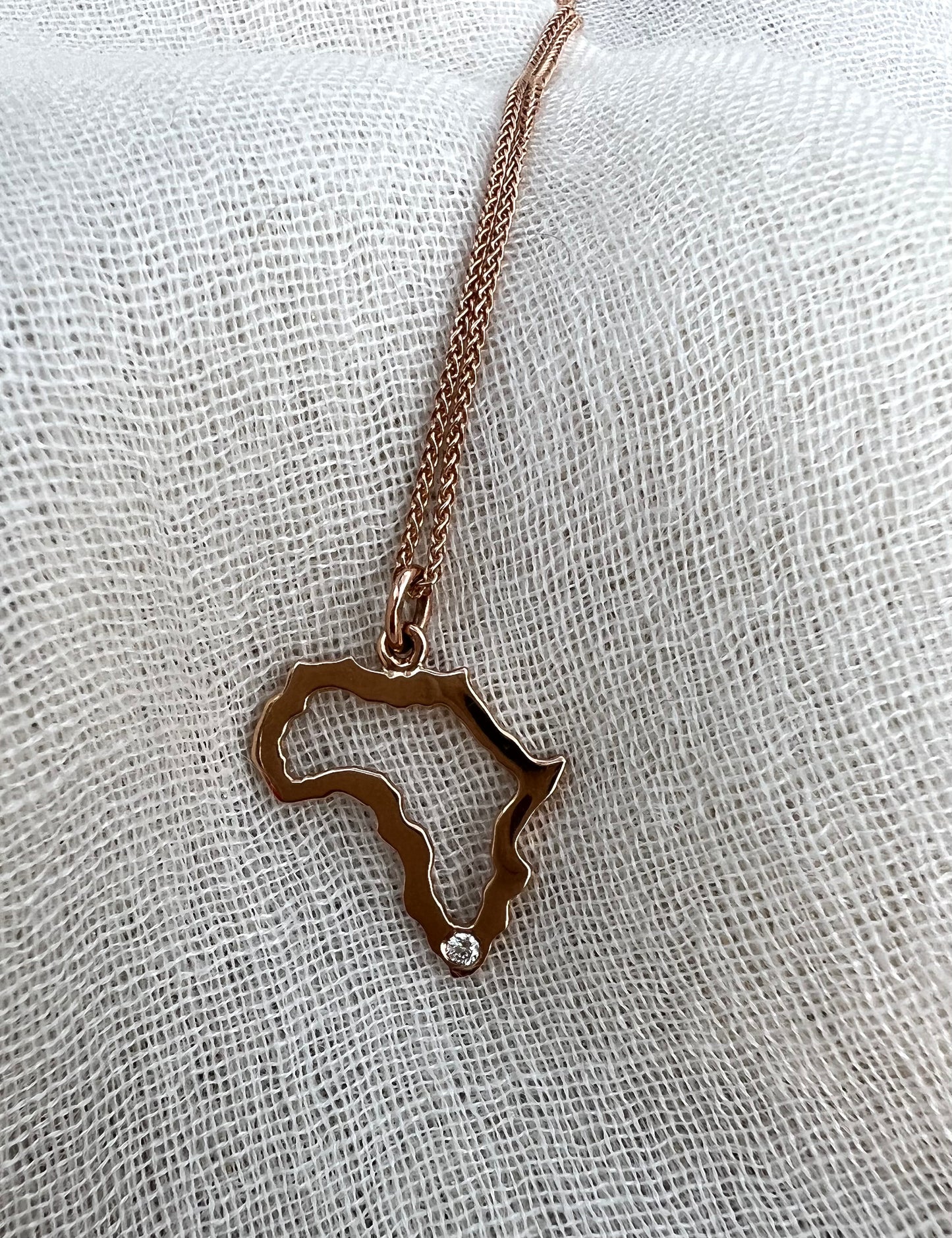 Africa frame pendant in rose gold